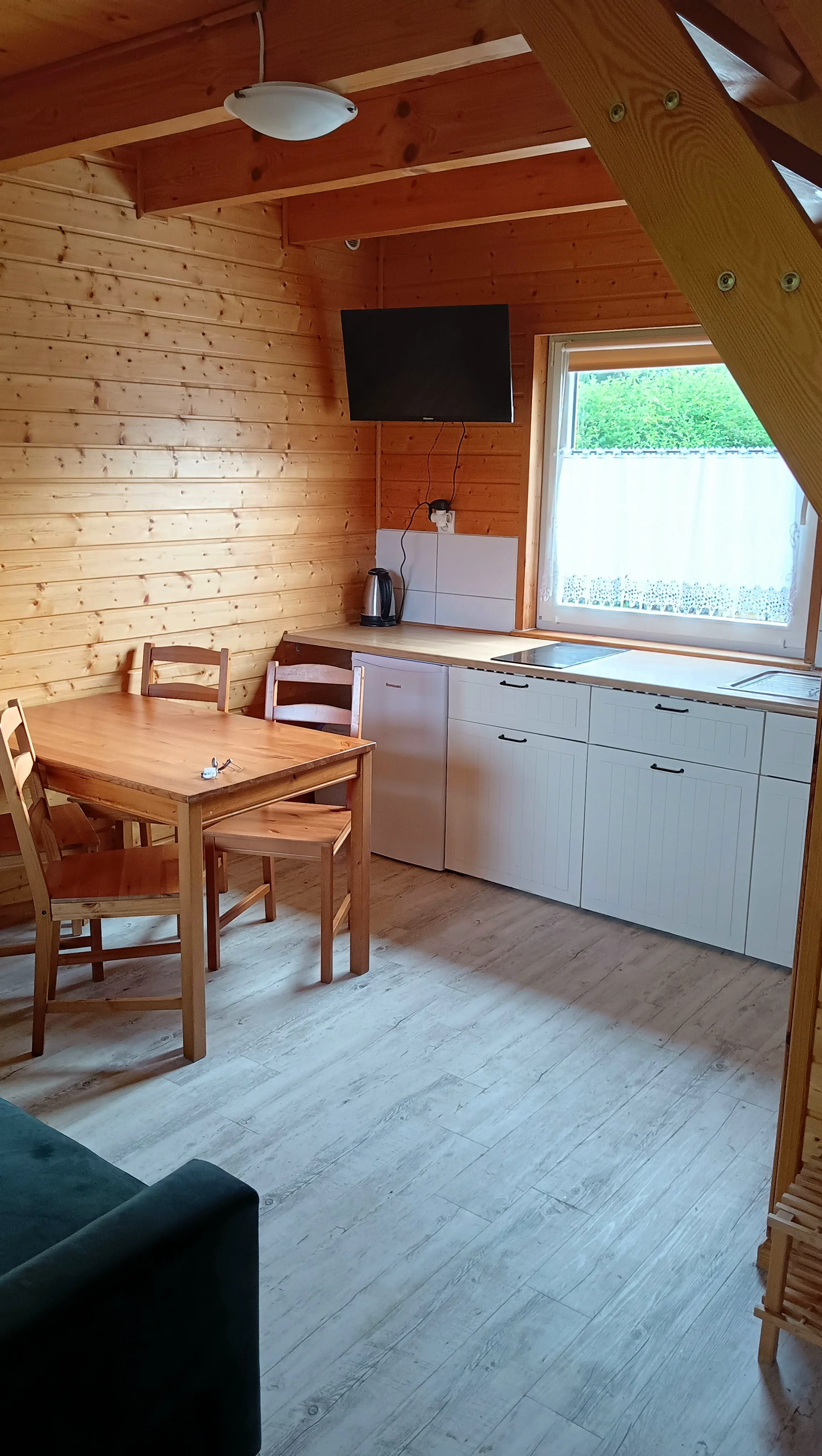 Salon w domku letniskowym Oaza Wicie